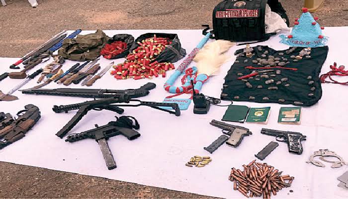 Auxiliary declared wanted, 11 pistols recovered in hotel