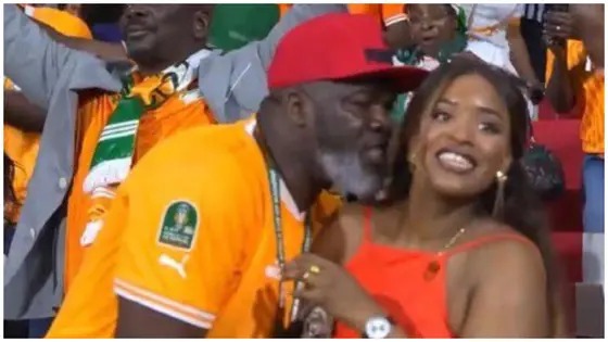 AFCON Update: Ivorian supporter issues a heartfelt apology to family after being caught courting a lady during the Senegal game